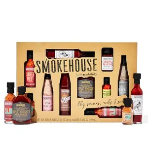 Smokehouse sample set with small glass jars of sauces, rubs and salts