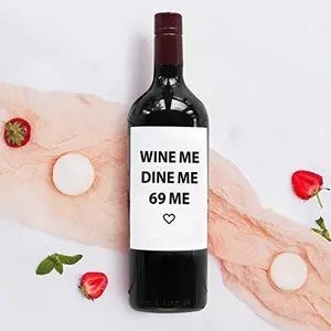 A humorous PATYZON anniversary wine label with witty text, shown on a standard wine bottle