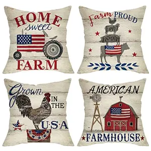 Set of four Fjfz farm animal patriotic pillow covers with tractor and barn designs displayed on a farmhouse couch