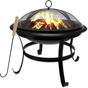 Small round black metal fire pit with mesh lid and fire picker on a porch