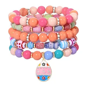 Set of five colorful beaded stretch bracelets with Easter bunny and egg charms