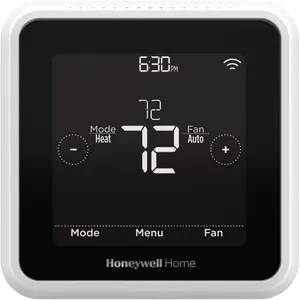 Honeywell T5 Smart Thermostat mounted on a wall, showing temperature