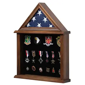 Walnut finish flag display case with document holder and felt lining, displaying a folded 3x5 flag and medals on a wall.