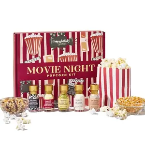 Thoughtfully Gourmet Movie Night Popcorn Set box with popcorn kernels, paper bags, and seasoning toppings