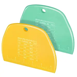 Teenitor two plastic bench scrapers in yellow and green with measurement scales
