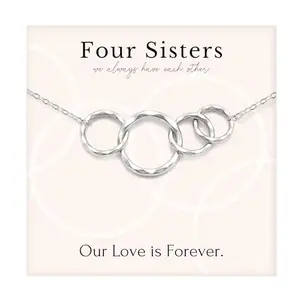 Sterling silver necklace with four interlocking rings symbolizing sisterhood