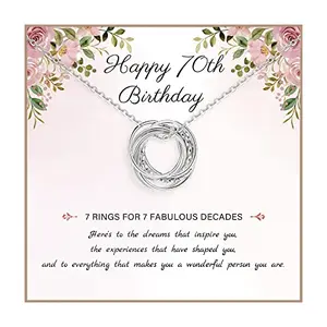 Sterling silver necklace with four interlocking circles representing 70 years of life