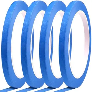 DOAY thin blue painter's tape roll against a painted wall