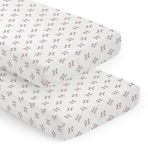 Red and white baseball print crib sheets on a mattress