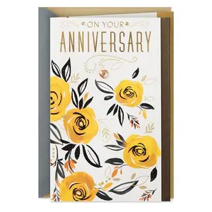 Hallmark anniversary card with painted yellow flowers, ribbon, and gemstone embellishment