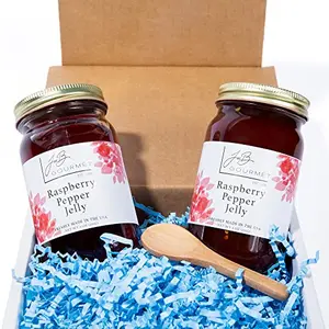 JoeB Gourmet Raspberry Red Pepper Jelly two jars with wooden spoon