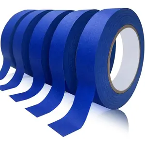 Five rolls of blue painter's tape stacked on a shelf