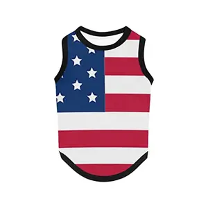 Small dog wearing patriotic vest with American flag print resting on a Thanksgiving tablecloth