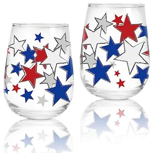 Pair of Whaline stemless glasses with red, blue, and silver stars