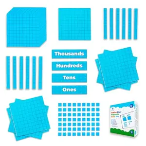 Blue magnetic base ten blocks with place value headings on a whiteboard
