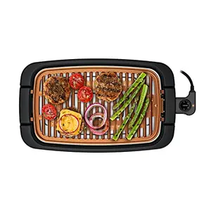 Chefman smokeless indoor electric grill with copper finish on a kitchen counter