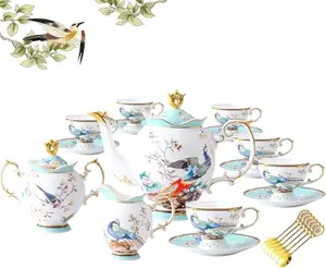 ACMLIFE bone china tea set with blue phoenix and peony design on a table
