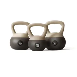 WeGym soft kettlebell set of three weights in sandstone finish, showing cushioned base
