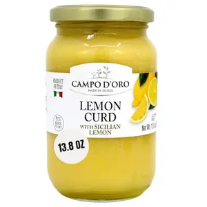 Campo D'Oro Sicilian Lemon Curd spooned onto a scone