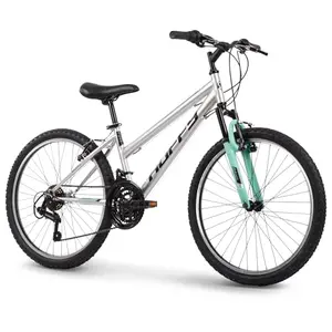 Huffy metallic nickel women's mountain bike on a path