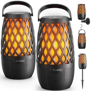 BolaButty outdoor bluetooth speakers with flickering flame lights on a table