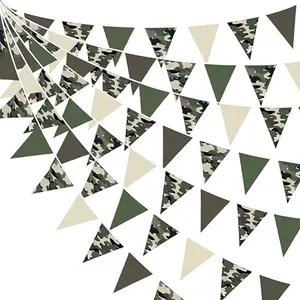 Pinkblume 32ft camouflage fabric bunting banner draped across a wooden fence at a baby shower