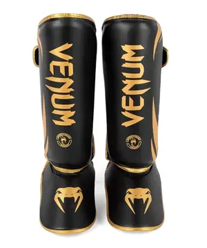 Venum Challenger Standup Shin Guards in black and gold, medium