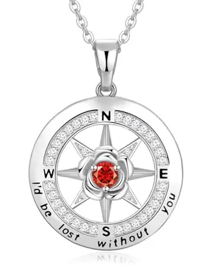 Meeshi compass ruby birthstone necklace on white background
