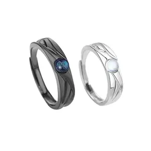 MIFYNN matching couple rings black and white set on a surface