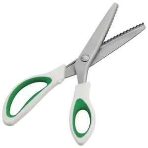 Fri4Free pinking shears with green soft grip handles cutting fabric