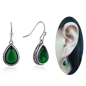 Silver-plated teardrop earrings with emerald green crystal and engraved edge, vintage style