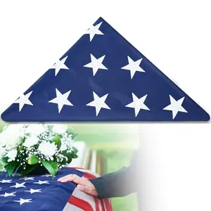 Pre-folded nylon American flag in triangular shape for memorial display