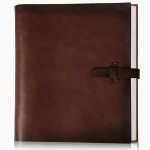 sucarlon genuine leather photo album open showing writing pages