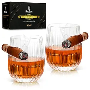 Two MortyGrove crystal cigar whiskey glasses with cigar holders on a dark surface