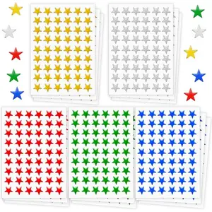 Small foil star stickers in assorted colors on a white sheet