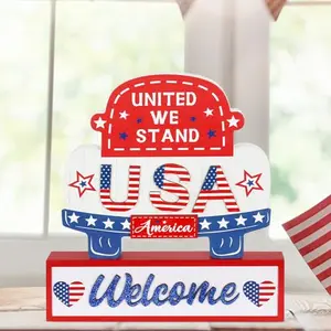 Multi-tiered wooden patriotic sign with truck and USA message on a fireplace mantle