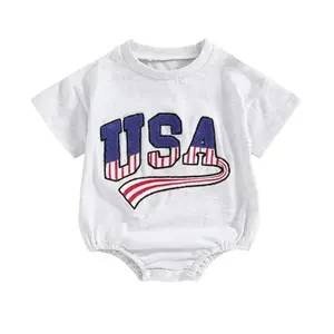 Baby wearing embroidered gray USA flag romper by Twopumpkin