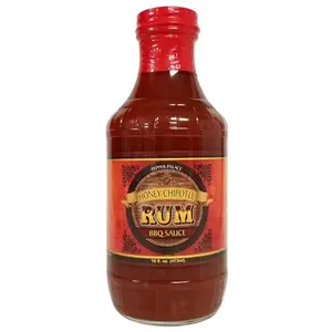 Pepper Palace Honey Chipotle Rum BBQ Sauce bottle with grilled shrimp and tropical theme