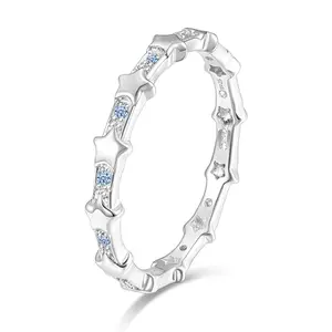 Sterling silver eternity ring with alternating stars and blue cubic zirconia, perfect for a patriotic July 4th proposal
