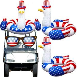 Two eagle hat shaped patriotic pool tubes in water