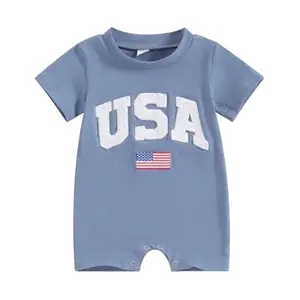 Blue baby romper with USA flag design and gold piping detail
