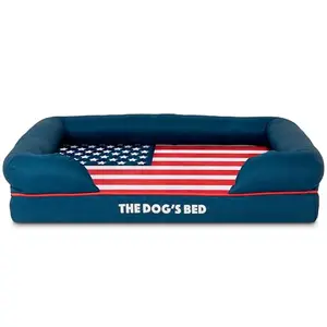 Medium bolster dog bed with USA flag pattern, blue with red trim