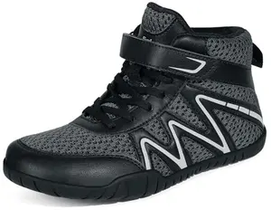Unbranded kids wrestling shoes in black and white with mid-top design and zero-drop sole