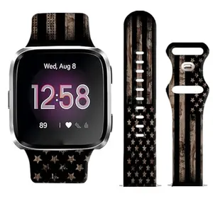 WLPFSAHF camo American flag silicone band installed on Fitbit Versa 2
