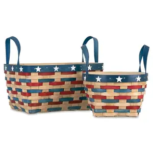 Two patriotic woven bamboo baskets by Current with handles