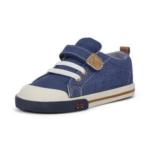 See Kai Run Stevie II sneakers in navy denim, side view showing hook and loop strap