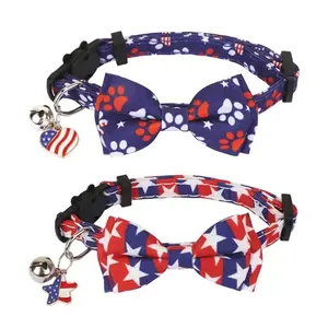 Two ADOGGYGO patriotic cat collars with bow ties and bells on a white background