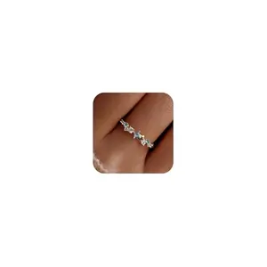 Gold-plated sterling silver stackable ring with star and blue cubic zirconia, perfect for a July 4th promise ring