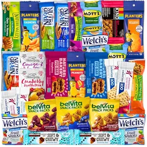 Assortment of individually wrapped healthy snacks including granola bars, nuts, and fruit snacks in a gift box