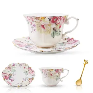 Single bone china teacup with pink country roses pattern, shown with saucer and spoon